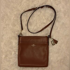 Coach North/South Swingpack